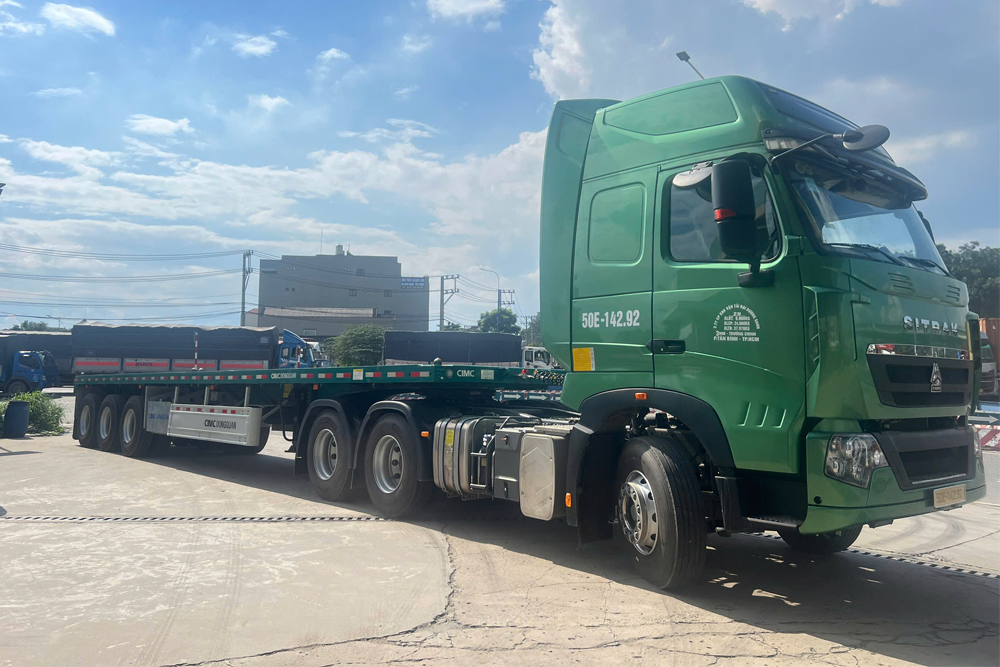 Bảng Giá Vận Chuyển Container Bằng Xe Mooc Sàn